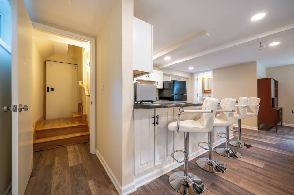 Entry with breakfast bar and stools