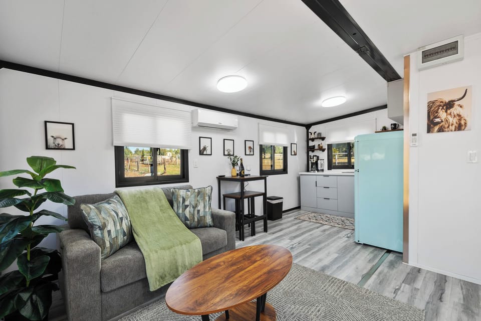 
A stylish Prescott tiny home bursting with charm-relax in cozy comfort, cook in the retro kitchen, and soak up serene farm views!