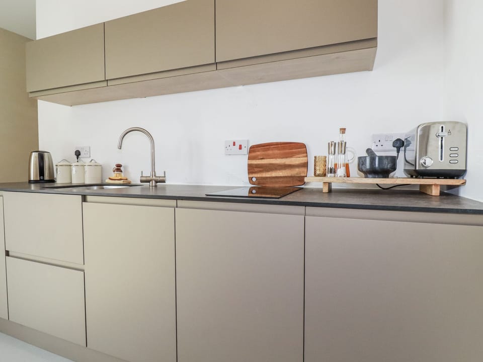 Fridge, toaster, cookware/dishes/utensils