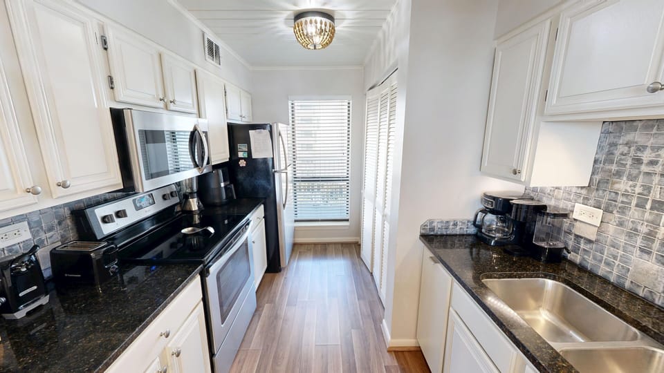 Condo, 2 Bedrooms | Private kitchen | Coffee/tea maker, fridge, oven, stovetop