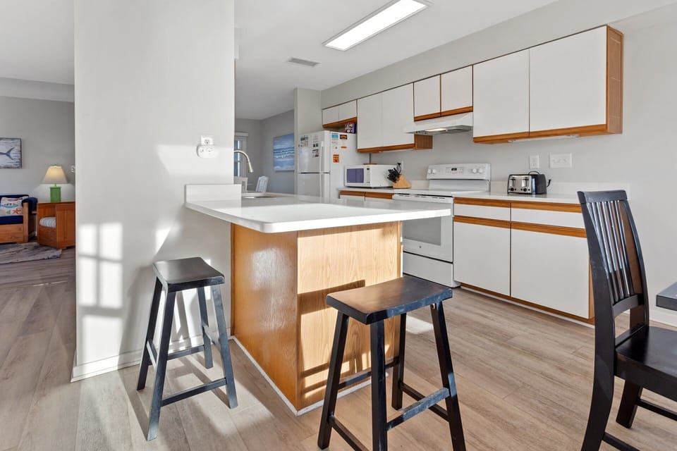 Convenient open dining area connecting seamlessly to the kitchen and living room.
