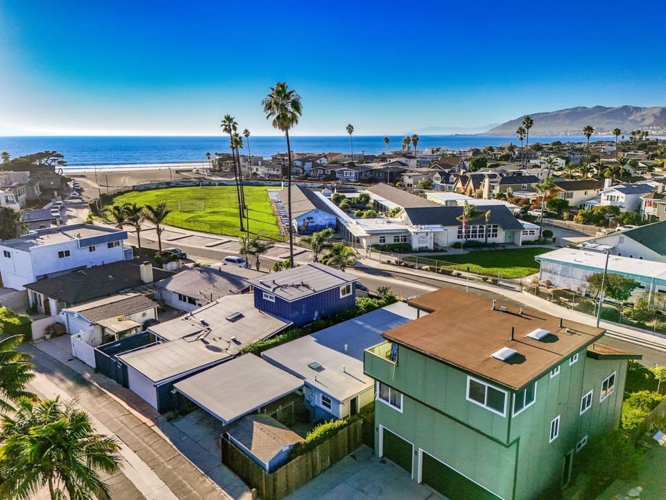 The perfect setting: Mountains, ocean, and miles of sun-drenched beach.