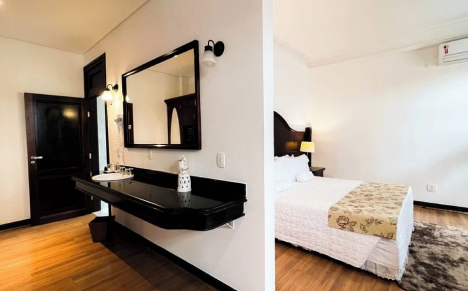 Get ready with ease at the sleek vanity and mirror