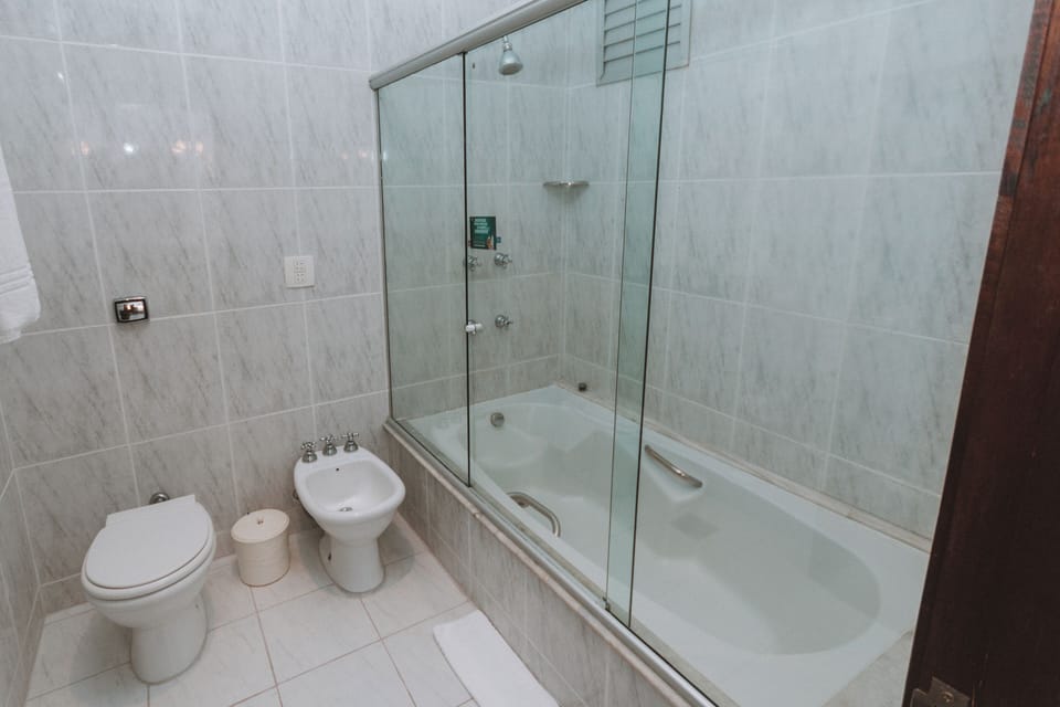 Rinse away the day with a spacious shower-tub combo.