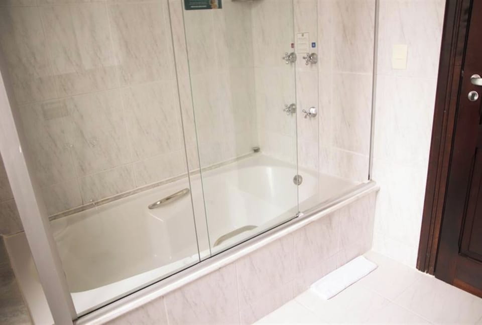 Refresh with a deep soak in the glass-enclosed tub.