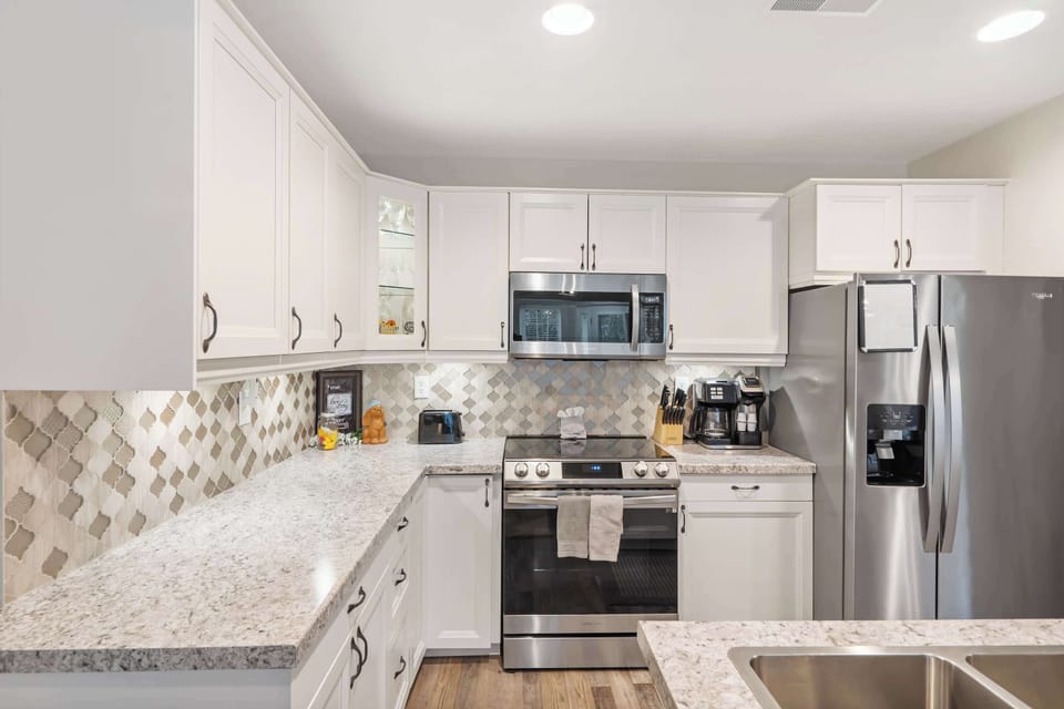 The open, airy kitchen offers ample space & all the comforts of home​