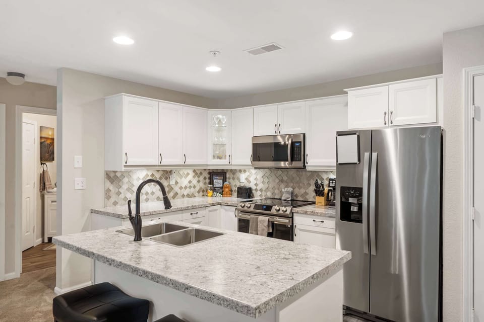 The open, airy kitchen offers ample space & all the comforts of home​