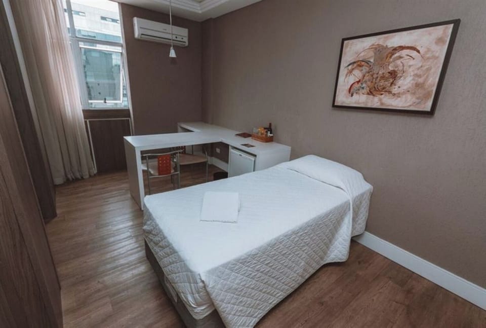 Recharge in a calm, minimalist room with soothing tones.