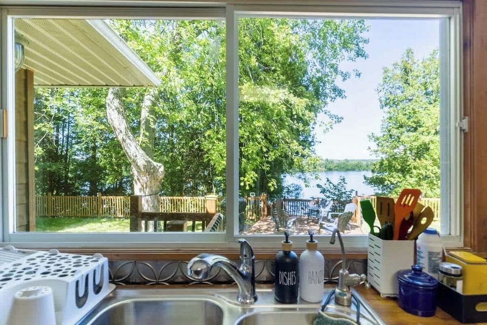 Bright kitchen with modern appliances and essentials for home cooking.