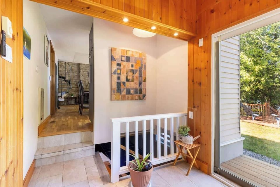 Warm and inviting interior with natural wood accents, comfortable furnishings, and thoughtfully designed spaces throughout.