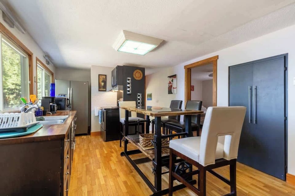 Bright kitchen with modern appliances and essentials for home cooking.