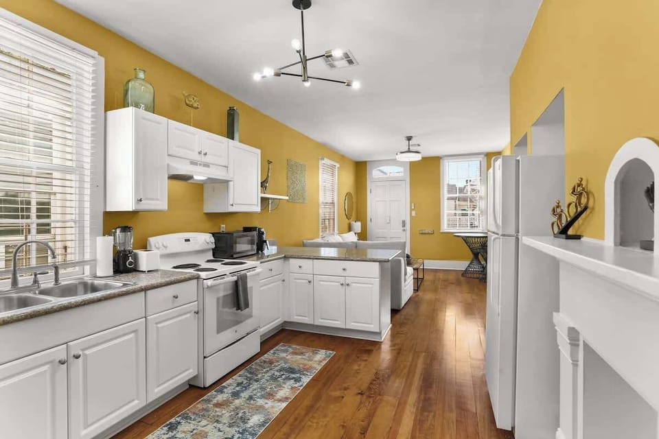 Fully equipped kitchen with generous counter space, making it easy to cook and gather as a group.