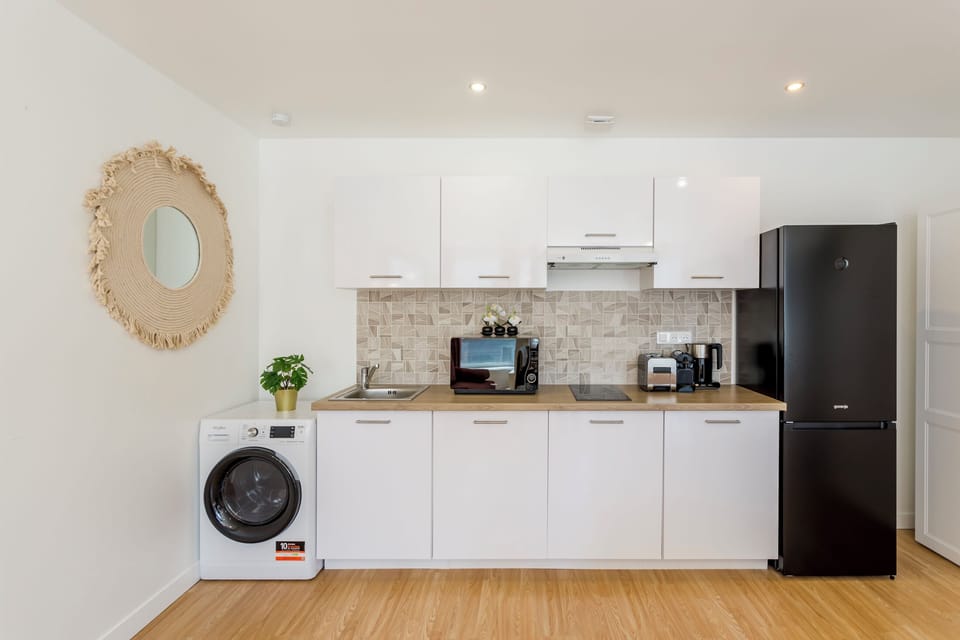 Apartment, Garden View | Private kitchen | Fridge, microwave, stovetop, electric kettle