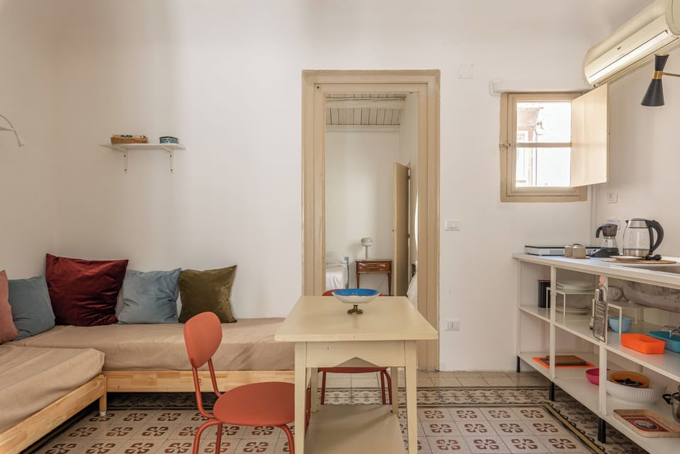 Apartment, 1 Bedroom | Living area | 30-inch TV with satellite channels