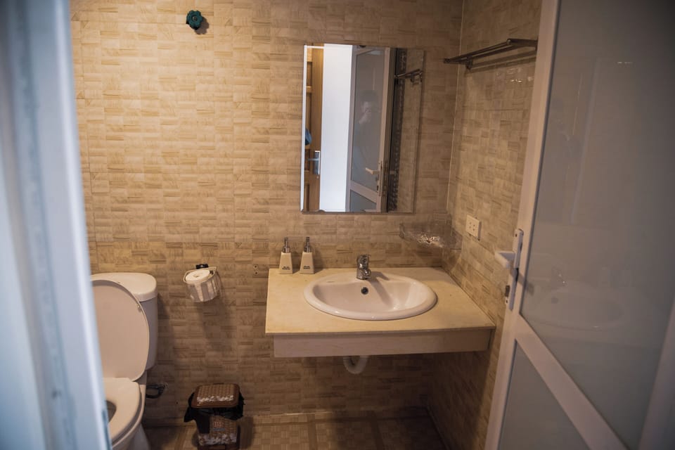 Shower, free toiletries, hair dryer, slippers