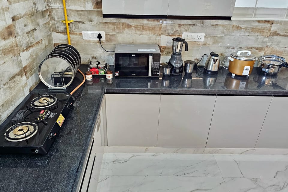 Fridge, microwave, stovetop, cookware/dishes/utensils