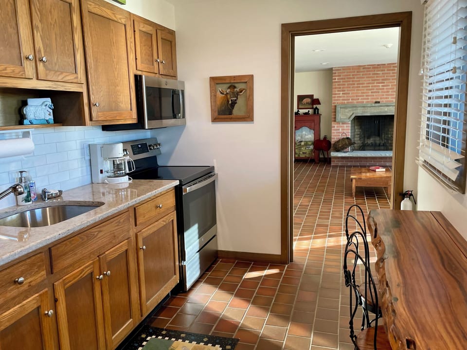 Pass through galley kitchen between sitting room and library