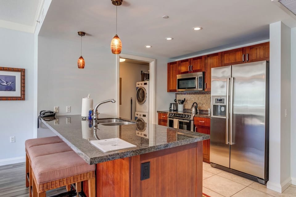     Gourmet kitchen with stainless steel appliances and resort views HKH-412