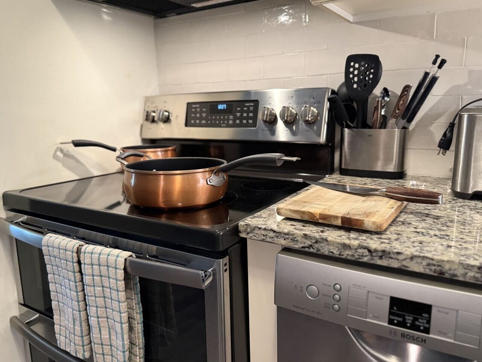 Prepare meals with ease in this fully equipped kitchen.