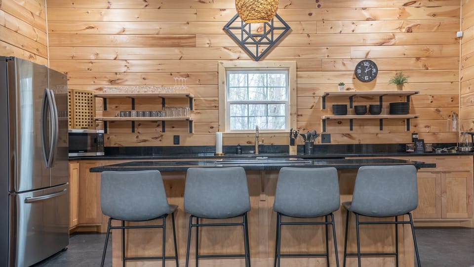 Spacious kitchen with island seating, perfect for cooking and gathering