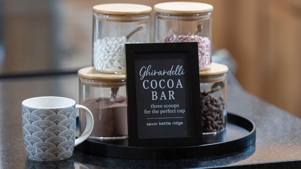 Complimentary cocoa bar with premium toppings for cozy nights in