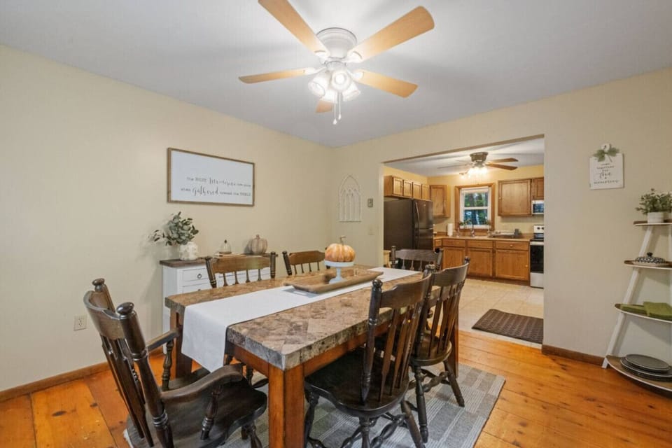 Enjoy warm meals and conversation in this welcoming, light-filled dining room.