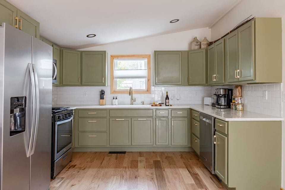A kitchen designed for culinary adventures and stocked with all the basics and pots and pans you need: what will you cook up today?