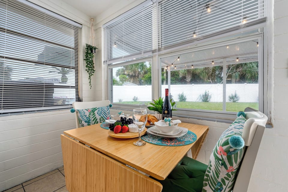 Tranquil Dining area with a beautiful view of the yard. The table opens up!