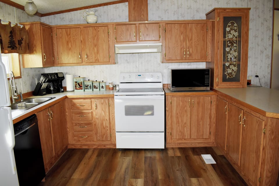 Looking at kitchen from table area.