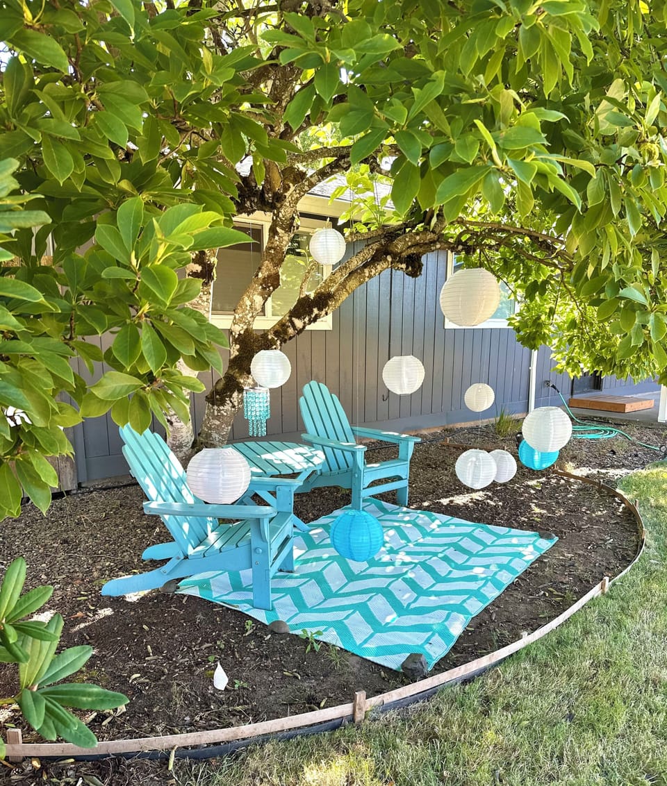 Unwind under a canopy of lanterns & a sparkling blue crystal chandelier!