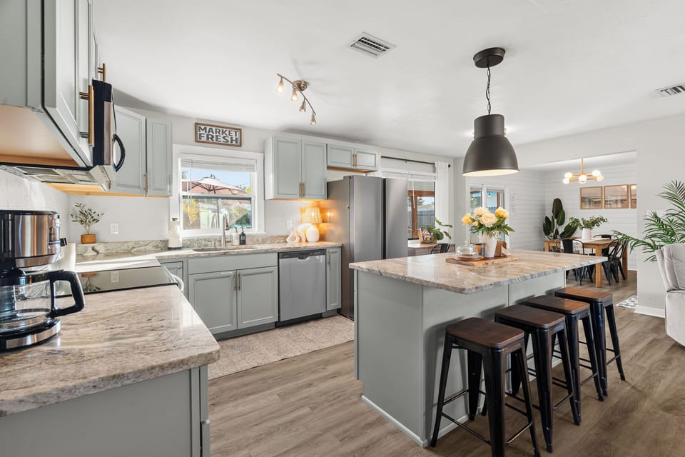 Beautiful, clean appliances and spacious countertops for cooking.