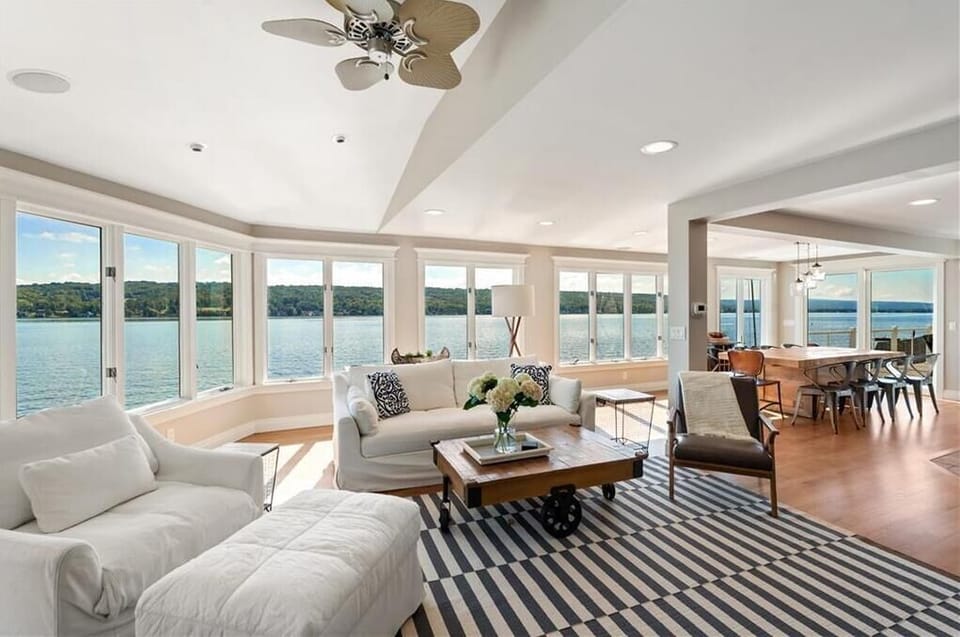 Panoramic Lake Views from the Main Living Room – Floor-to-ceiling windows bring the lake right inside.