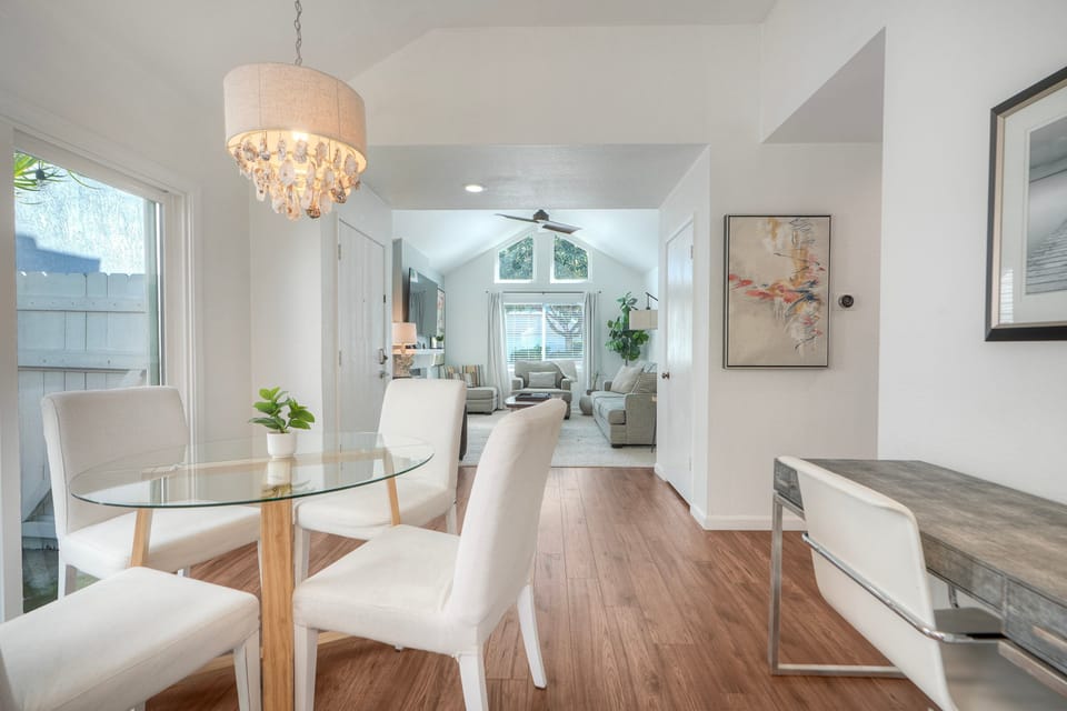 Open dining space with views into living room