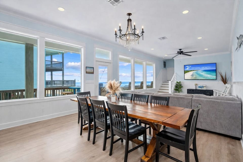Seamless open-concept layout connecting dining and living areas—ideal for entertaining and large group stays in Bolivar Peninsula.