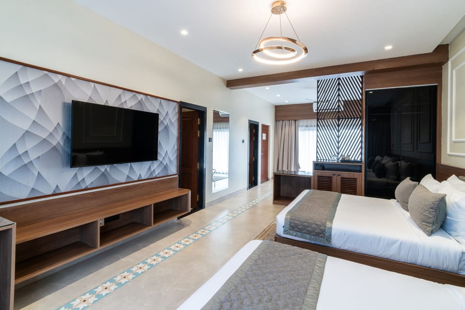 Family Suite | Minibar, desk, blackout drapes, iron/ironing board (on request)