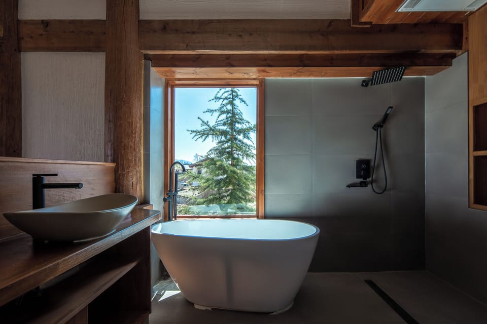 Signature Double Room, Balcony, Mountain View | Bathroom | Rainfall showerhead, free toiletries, hair dryer, slippers