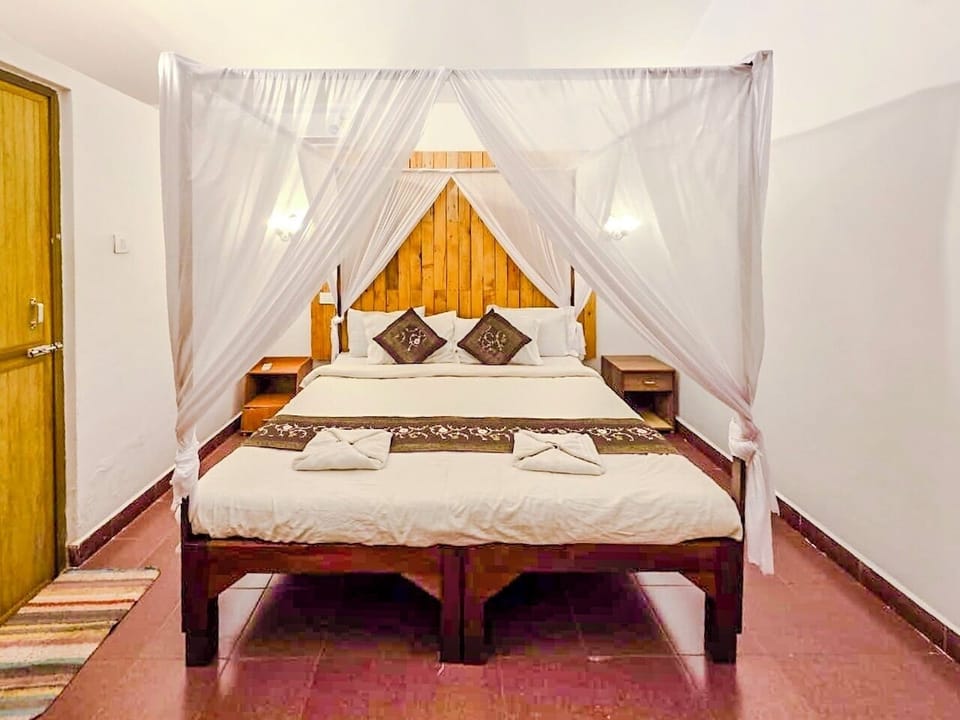 Deluxe Double Room, Pool View | Desk, laptop workspace, free WiFi