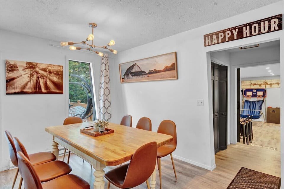 Dining Area with Modern Lighting & Open Floor Plan
