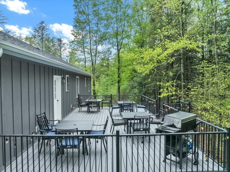 Expansive Deck with Outdoor Dining & Forest Views