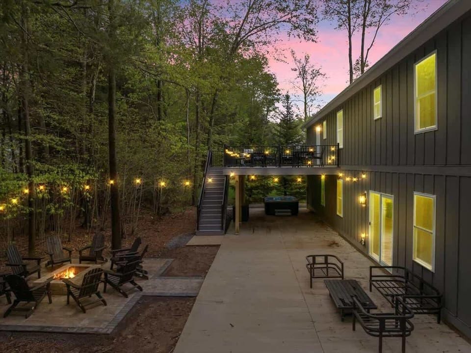 Evening Exterior Walkway with Ambient Lighting & Forest Setting