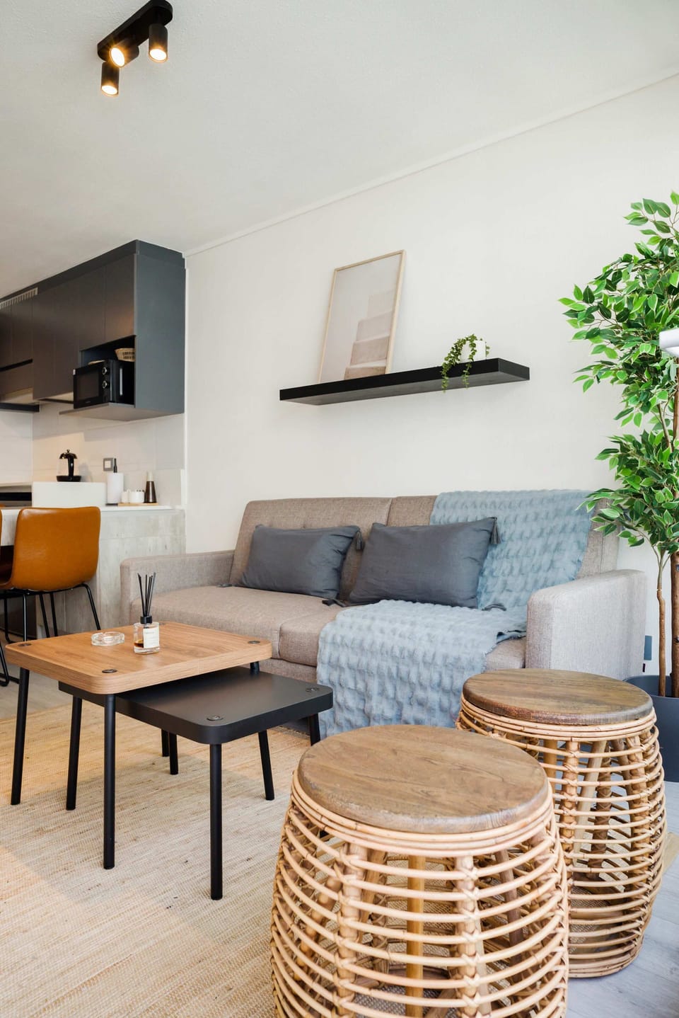 Relax in this stylish living area with cozy seating and modern decor, perfect for unwinding after a day of exploring.
