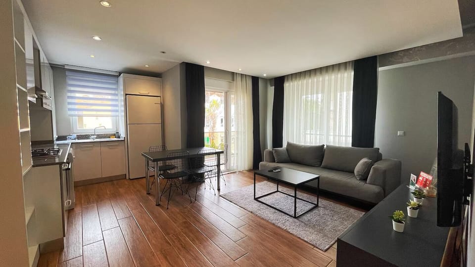 Grand Apartment, 2 Bedrooms, Balcony | Living area | 43-inch TV with satellite channels, Netflix, streaming services