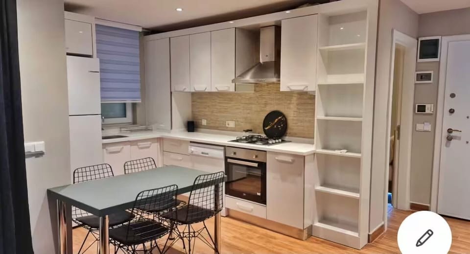 Grand Apartment, 2 Bedrooms, Balcony | Private kitchen | Full-size fridge, oven, stovetop, dishwasher