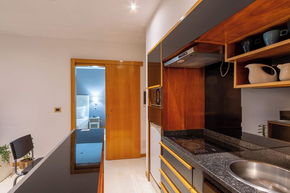 Family Studio Suite, City View | In-room safe, WiFi (free)