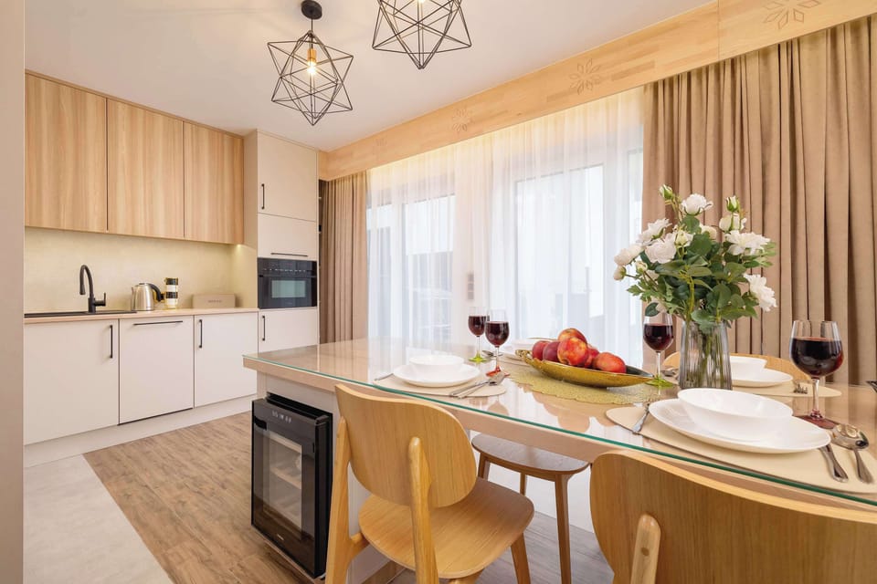 Bright open-plan kitchen and dining area – Perfect for home-cooked meals and morning coffee with sunlight streaming in.