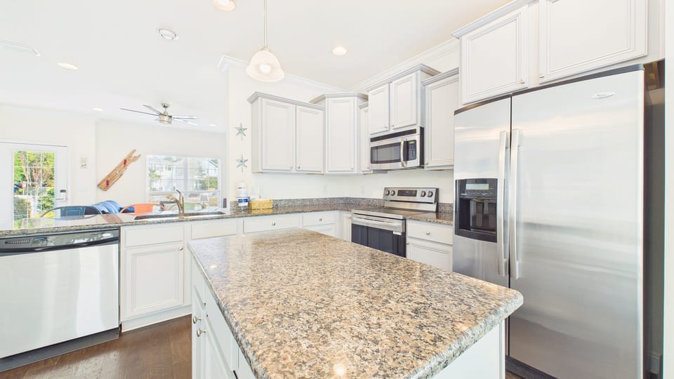 Full kitchen with island and all the cooking essentials