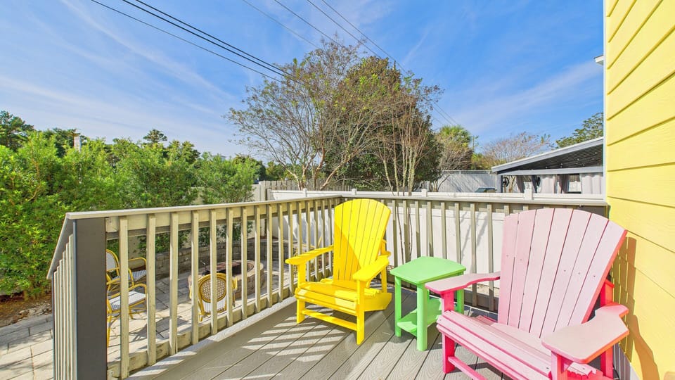 Back porch with ample seating and scenic views