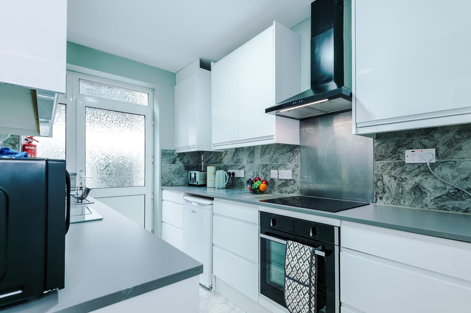 The kitchen is fully equipped with all the essentials for easy meal preparation, ideal for families travelling together.