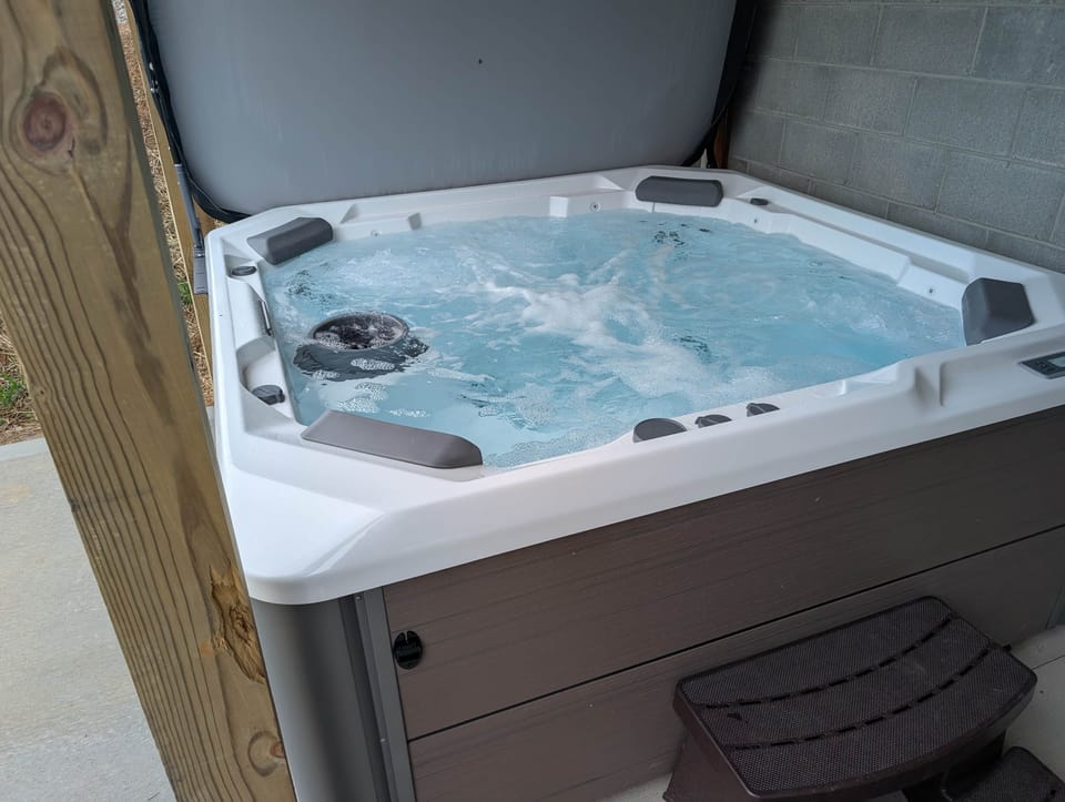 Enjoy some relaxation in this saltwater hot tub.