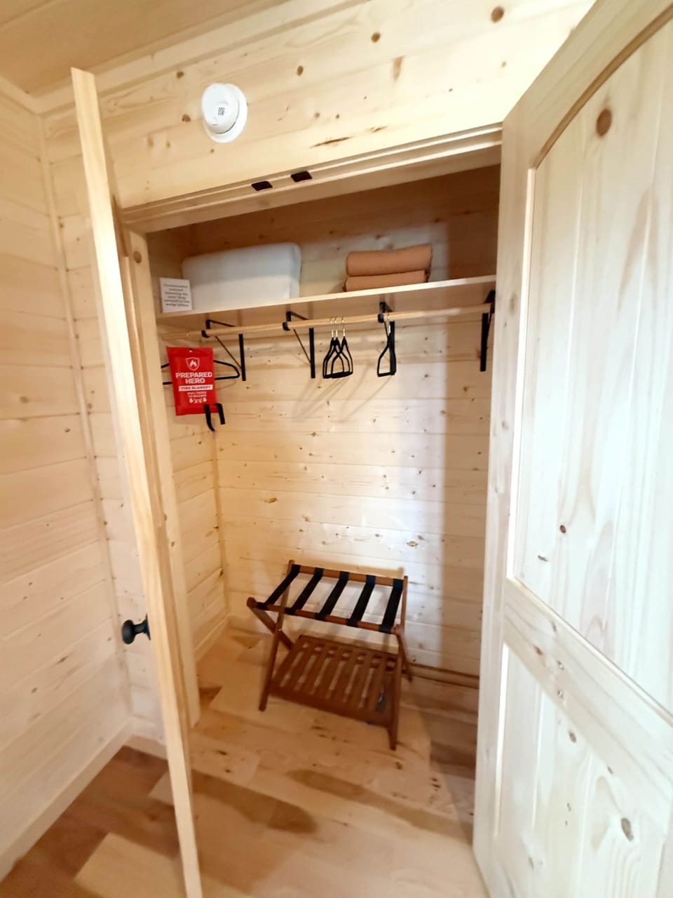 A peak inside the closet :)  Includes extra blankets and a wedge pillow if needed from exploring.